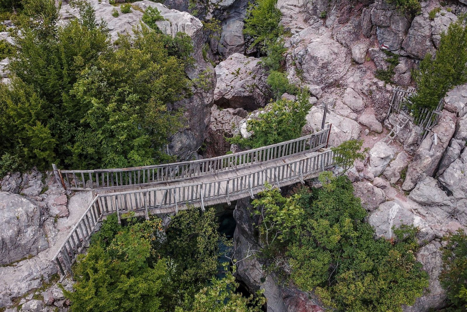 Wooden Footbridge Crossing the Grunas Canyon, Balkans Albania.jpg