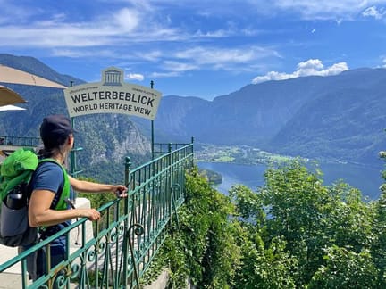 Hiker overlooking Hallstatt and the vast lake from the Skywalk Welterbeblick - supplied by Eurohike