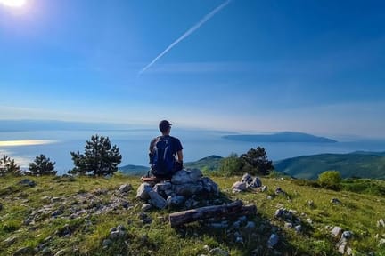 Hiker at Vojak Lookout overlooking the Istrian coast and islands