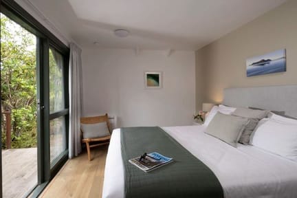 Tranquil-Bedroom-with-Nature-Views-Awaroa-Lodge