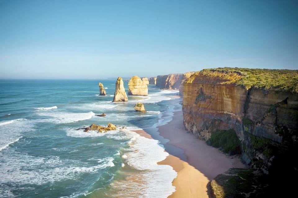 The Twelve Apostles limestone sea stacks rising from the Southern Ocean alongside dramatic cliffs, Great Ocean Walk, Victoria, Australia