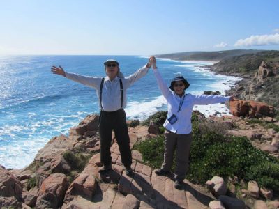 Walkers standing on a lookout on the cape to cape trail