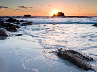 View of sunset over the ocean on the Cape to Cape trail